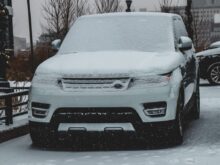 snow covered Land Rover Range Rover SUV