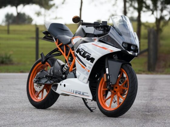 white and orange KTM sports bike selective focus photography
