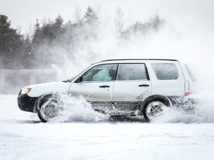 black suv on snow covered ground