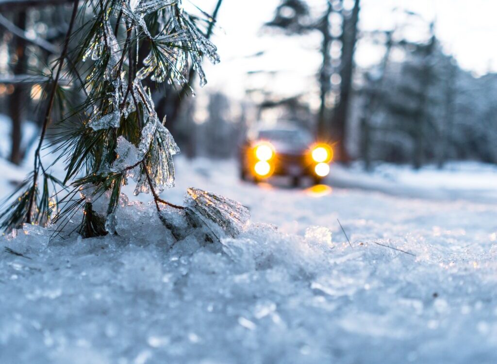 car on snow during daytime