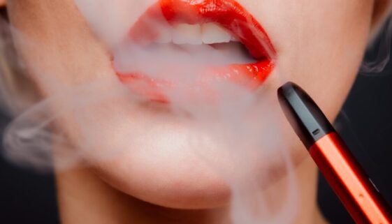woman with red lipstick and red lipstick