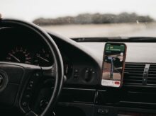 smartphone turned-on in vehicle mount inside vehicle
