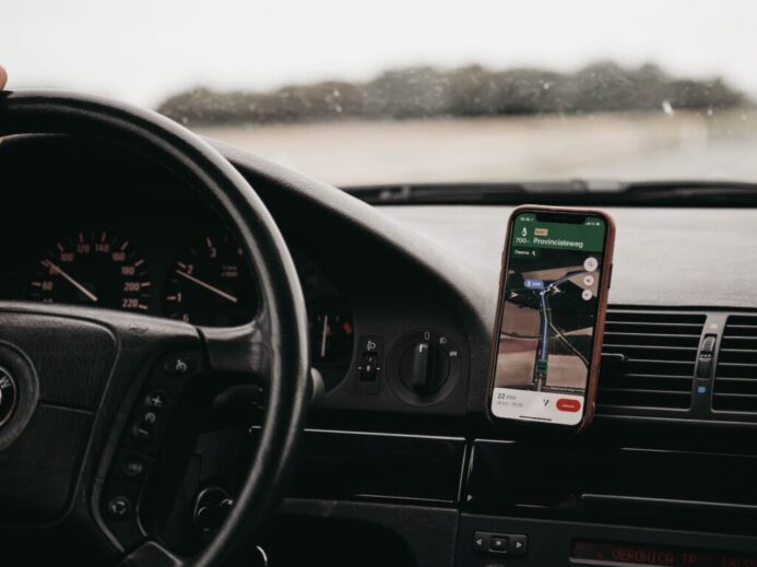 smartphone turned-on in vehicle mount inside vehicle