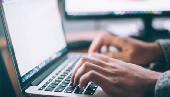 person using MacBook Pro