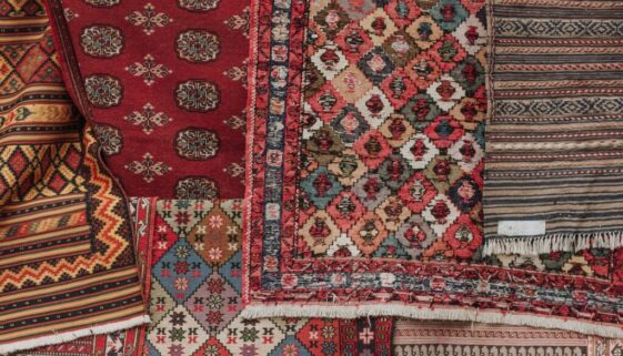 red white and black floral textile