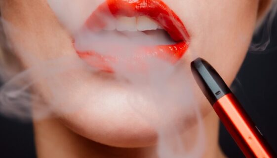 woman with red lipstick and red lipstick