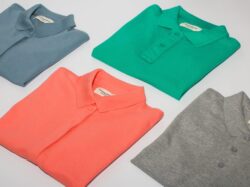 green crew neck shirt and gray crew neck shirt