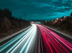 time lapse photography of cars on road during night time