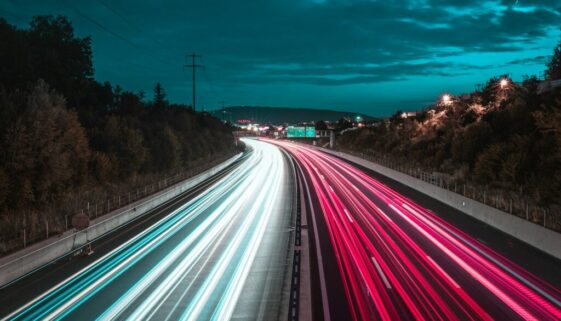 time lapse photography of cars on road during night time