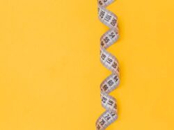 black and white snake on yellow background