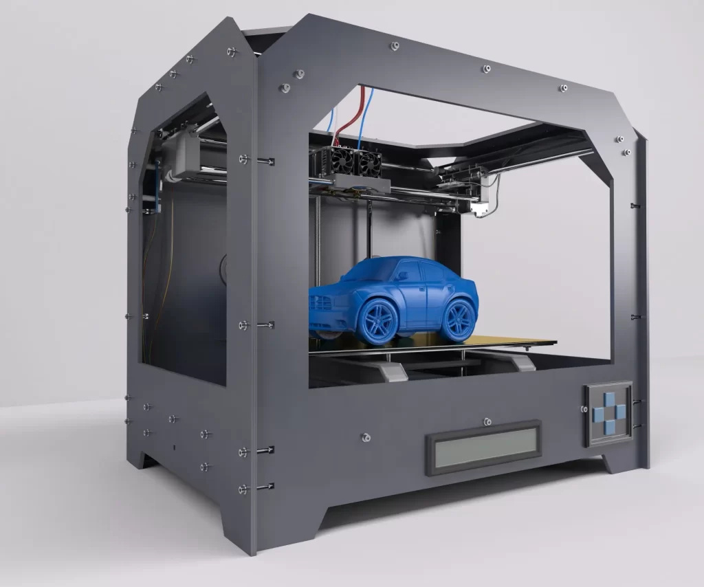 3D tiskárna, která právě tiskne modrý model osobního automobilu.
